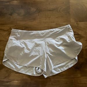 Lilac colored lulu lemon size 12 shorts.